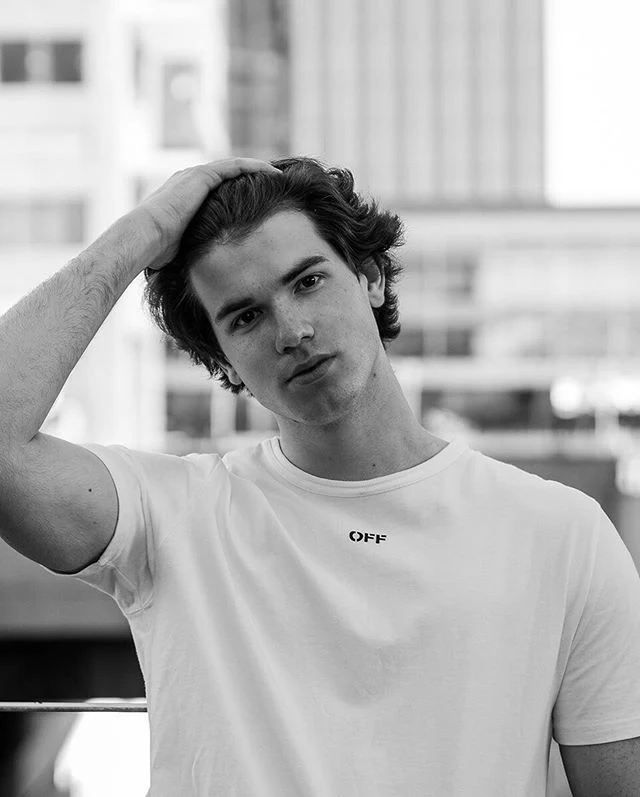 Black-and-white editorial portrait used as a visual stand-in, not Simon Riley